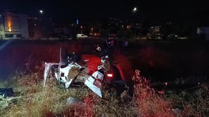 Bursa’da kontrolden çıkan otomobil araziye savrulup takla attı